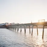 Sun through the pier Deal 