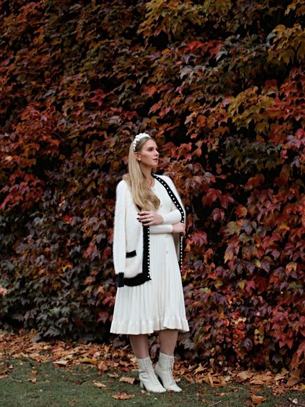 Total Chanel vibes from this cardigan with pearl trim https://www.chicwish.com/shimmer-fuzzy-knit-pearly-cardigan-in-white.html