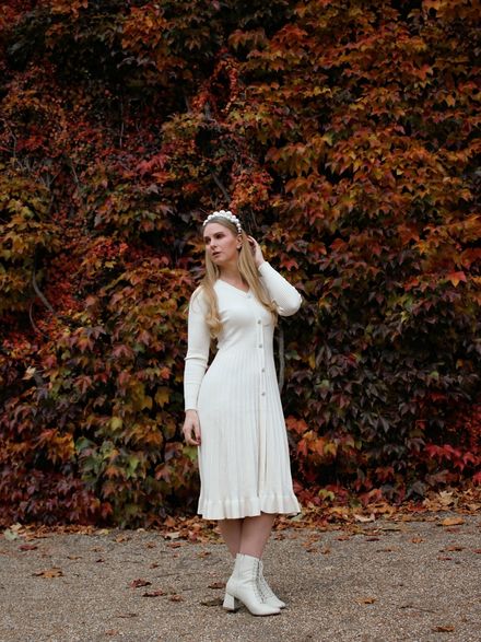 The chicest knit dress, and it is so soft and comfortable too. https://www.chicwish.com/button-front-ribbed-knit-a-line-midi-dress-in-cream.html
