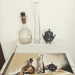 Bottles and sugar bowl